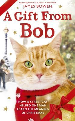 A gift from Bob [large type] : how a street cat helped one man learn the meaning of Christmas /