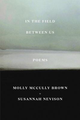 In the field between us : poems /