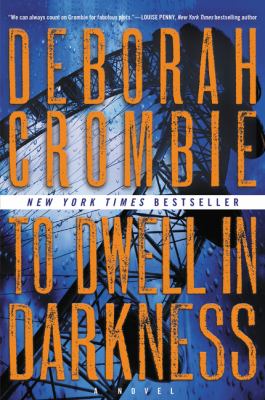 To dwell in darkness : a novel /