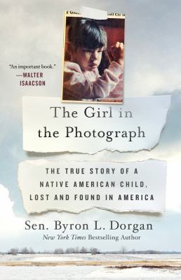 The girl in the photograph : the true story of a Native American child, lost and found in America /