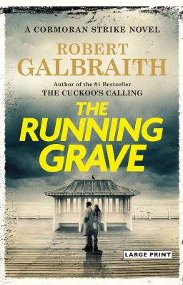 The running grave [large type] /