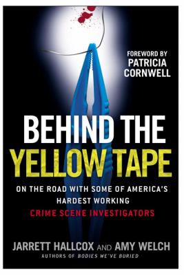 Behind the yellow tape : on the road with some of America's hardest working crime scene investigators /