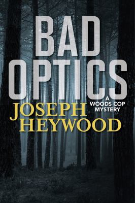 Bad optics : a Woods cop mystery /