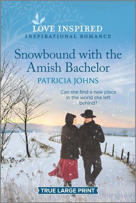 Snowbound with the Amish bachelor [large type] /