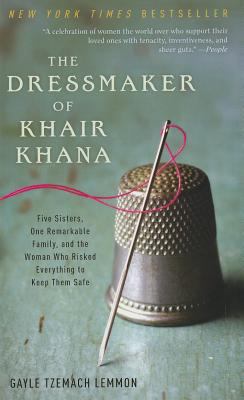 The dressmaker of Khair Khana [large type] : five sisters, one remarkable family, and the woman who risked everything to keep them safe /