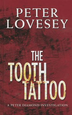 The tooth tattoo [large type] /