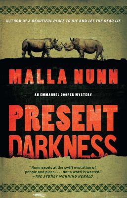 Present darkness : a novel /